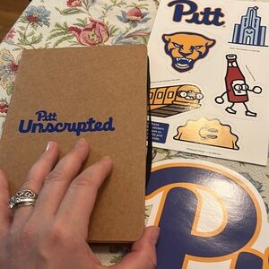 Pitt, University of Pittsburgh stickers and notebook.